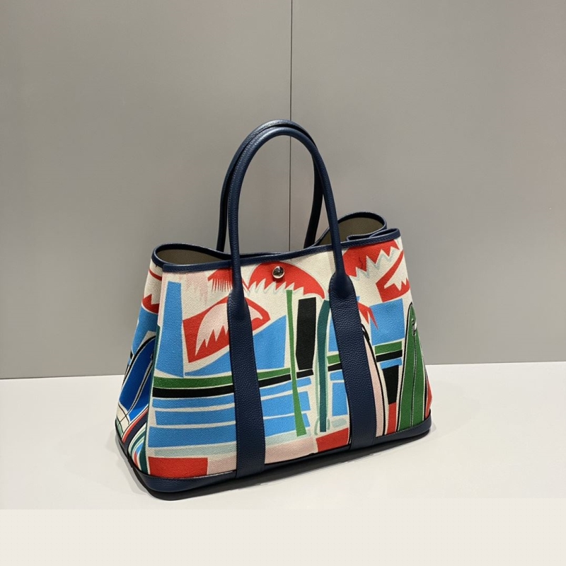 H**mes shopping bags